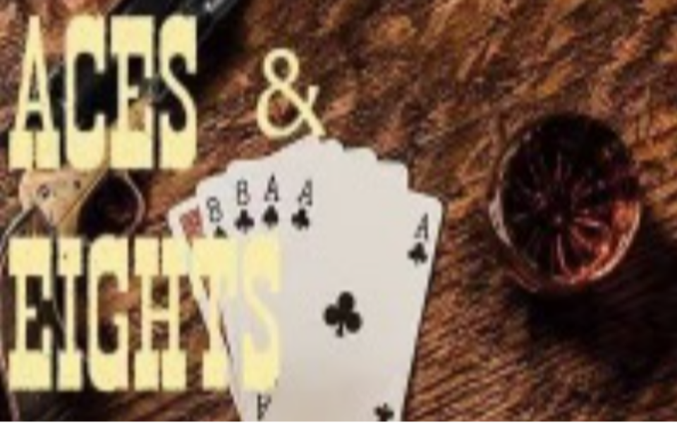 Cards on a wooden table with, "Aces & Eights" in text on top.