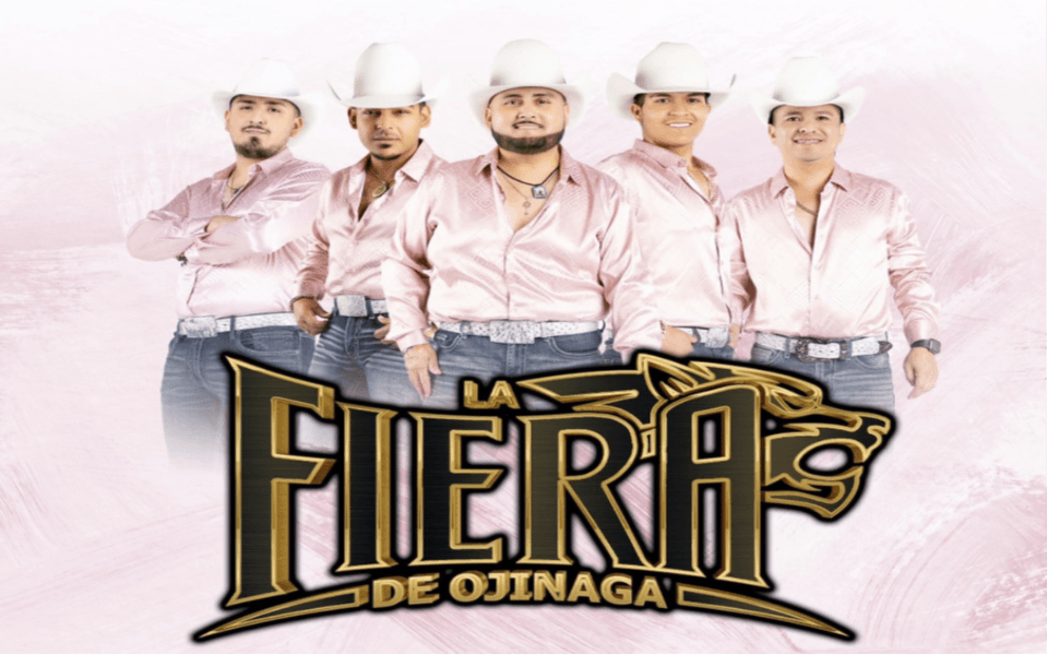 Members of La Fiera De Ojinaga posed with text for their group name.