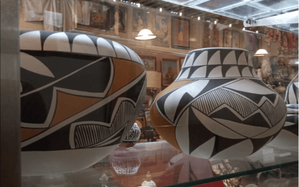 Image of two clay pots in an emporium.