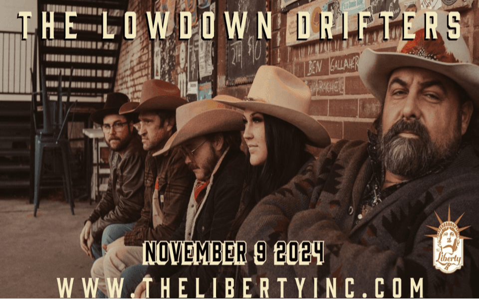 The Lowdown Drifters members lined up against a brick wall for their event image.